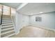 Finished basement with hardwood floors, recessed lighting, and access to stairs at 5262 E Sandpiper Ave, Castle Rock, CO 80104