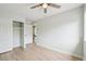 This bedroom features a ceiling fan and a walk-in closet at 5262 E Sandpiper Ave, Castle Rock, CO 80104