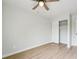 This bedroom features a ceiling fan and an open closet at 5262 E Sandpiper Ave, Castle Rock, CO 80104