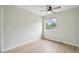 This bedroom features a ceiling fan and a large window at 5262 E Sandpiper Ave, Castle Rock, CO 80104