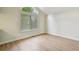 Bright bedroom featuring hardwood floors and a large window at 5262 E Sandpiper Ave, Castle Rock, CO 80104
