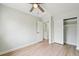 This bedroom features a ceiling fan and a walk-in closet at 5262 E Sandpiper Ave, Castle Rock, CO 80104