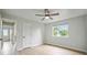 Bedroom featuring hardwood floors, a ceiling fan, and a bright window at 5262 E Sandpiper Ave, Castle Rock, CO 80104
