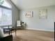 Modern living room with large window, neutral walls, and contemporary decor at 5262 E Sandpiper Ave, Castle Rock, CO 80104