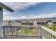 Scenic view from the balcony overlooking well-kept landscaping and neighboring houses at 16978 W 87Th Ave, Arvada, CO 80007