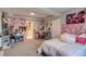 Bedroom with desk and vanity area, personalized with themed decor and bright lighting at 16978 W 87Th Ave, Arvada, CO 80007