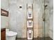Contemporary bathroom with tiled shower, stylish fixtures, and unique towel ladder at 1720 Wazee St # 2B, Denver, CO 80202