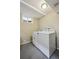 Laundry room equipped with a modern washer and dryer set at 1646 S Stuart St, Denver, CO 80219