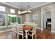 Beautiful dining room with large windows and hardwood floors at 14022 E Fair Pl, Centennial, CO 80111