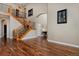 Elegant foyer with hardwood floors and grand staircase at 14022 E Fair Pl, Centennial, CO 80111