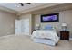 Cozy main bedroom features tray ceilings and bright natural light at 14022 E Fair Pl, Centennial, CO 80111
