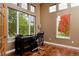 Bright office space with large windows and beautiful hardwood floors at 14022 E Fair Pl, Centennial, CO 80111