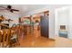Open-concept kitchen with an island, stainless steel appliances, and hardwood floors at 1922 Graves Ct, Northglenn, CO 80233