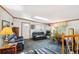 Comfortable living room with a skylight, fireplace, and plush seating at 1922 Graves Ct, Northglenn, CO 80233