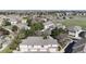 Areal view features well-maintained townhomes nestled among lush greenery, set against a backdrop of a suburban neighborhood at 1381 W 112Th Ave # B, Westminster, CO 80234