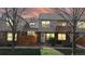 Charming townhome featuring well-maintained front yard, brick accents, and a cozy fenced-in patio area at 1381 W 112Th Ave # B, Westminster, CO 80234