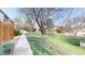 Beautifully landscaped grounds with mature trees, lush green lawns, and well-maintained sidewalks in a serene neighborhood at 1381 W 112Th Ave # B, Westminster, CO 80234