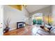Inviting living room with a fireplace, hardwood floors, natural light, and access to outdoor area at 1381 W 112Th Ave # B, Westminster, CO 80234