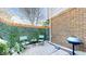 Cozy patio featuring a faux-foliage wall for added privacy, a grill, seating, and an outdoor rug at 1381 W 112Th Ave # B, Westminster, CO 80234