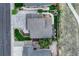 Aerial view of house, driveway, and back yard; includes street, sidewalk, and neighbor's house at 1497 Bent Grass Cir, Castle Rock, CO 80109