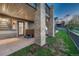 Outdoor patio with a hot tub, offering relaxing views of the surrounding green space and neighborhood at 1497 Bent Grass Cir, Castle Rock, CO 80109
