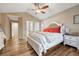 Comfortable main bedroom with vaulted ceiling and ample natural light at 1497 Bent Grass Cir, Castle Rock, CO 80109