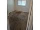 Bedroom featuring neutral carpet, white walls, and a small window with blinds at 18249 E Mexico Pl, Aurora, CO 80017