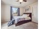 Bedroom features large windows and carpeted floors at 4151 S Lewiston Cir, Aurora, CO 80013