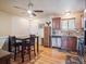 Eat-in kitchen features stainless steel appliances, granite countertops and hardwood floors at 4151 S Lewiston Cir, Aurora, CO 80013