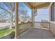 Covered front porch with decorative railing and room to relax on a sunny afternoon at 3744 Gypsum Ct, Superior, CO 80027