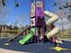 Colorful playground for to enjoy, with slides, climbing structures, and a safe play surface at 3744 Gypsum Ct, Superior, CO 80027