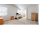 Large bedroom with a treadmill and an en suite bathroom featuring a soaking tub at 14230 Lakeview Ln, Broomfield, CO 80023