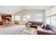 Open living space with tiled entry and large windows for plenty of natural light at 14230 Lakeview Ln, Broomfield, CO 80023