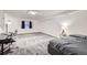 A bright and spacious basement, suitable for a bedroom and study area, enhanced by neutral carpet and tasteful decor at 800 Illinois St # 1, Golden, CO 80401