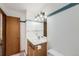 Neutral bathroom features vanity sink, mirrored medicine cabinet, and toilet at 800 Illinois St # 1, Golden, CO 80401