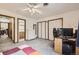 Carpeted bedroom with closets, ceiling fan, and desk at 800 Illinois St # 1, Golden, CO 80401