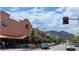 A sunny commercial district scene with local shops and restaurants nestled at the foot of scenic mountains at 800 Illinois St # 1, Golden, CO 80401