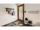 Welcoming entryway features slate floors, coat rack, and convenient shoe storage at 800 Illinois St # 1, Golden, CO 80401