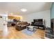 Inviting living room with hardwood floors, fireplace, and abundant natural light at 800 Illinois St # 1, Golden, CO 80401