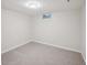 Finished basement featuring carpeted flooring and neutral paint at 1219 S Yosemite Way # 63, Denver, CO 80247