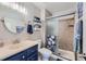 Clean bathroom with shower, toilet and vanity at 3452 S Eagle St # 201, Aurora, CO 80014