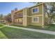 Exterior view of the building, showing a balcony and landscaping at 3452 S Eagle St # 201, Aurora, CO 80014