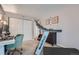 Home office with treadmill and desk setup at 3452 S Eagle St # 201, Aurora, CO 80014