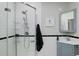 Clean bathroom, with shower and corner vanity at 521 E 14Th Ave # 18, Denver, CO 80203