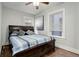 Spacious bedroom with a queen bed and hardwood floors at 521 E 14Th Ave # 18, Denver, CO 80203