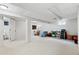 Spacious basement with neutral carpet, ready for customization and additional living space at 7350 Devinney Ct, Arvada, CO 80005