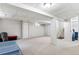Large finished basement offering flexible space for recreation, storage, or home office at 7350 Devinney Ct, Arvada, CO 80005