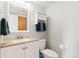 Clean and well-maintained bathroom with modern fixtures and ample storage at 7350 Devinney Ct, Arvada, CO 80005