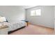 Bright bedroom with natural light, providing a serene and inviting space to unwind at 7350 Devinney Ct, Arvada, CO 80005
