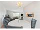 Cozy dining area with a chandelier, and convenient built-in shelving near the living area at 7350 Devinney Ct, Arvada, CO 80005